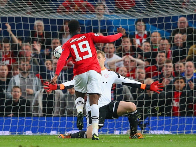Danny Welbeck of Manchester United attempts to chip the goalkeeper Manuel Neuer of Bayern Muenchen during the UEFA Champions League Quarter Final first leg match on April 1, 2014