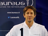 Edwin van der Sar OON poses near the Laureus logo during the Laureus Family Event held at Indoor-Sportcentrum on November 27, 2013