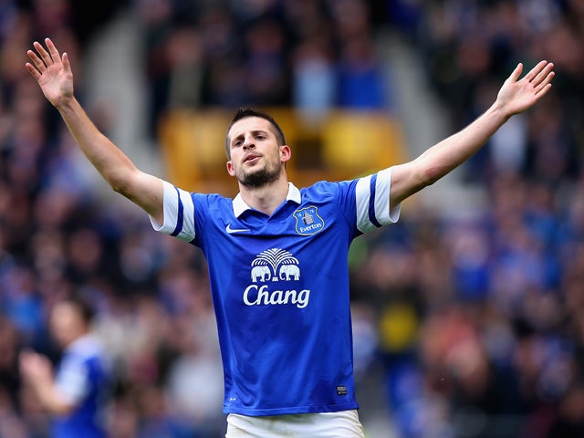 Kevin Mirallas of Everton celebrates scoring the third goal during the Barclays Premier League match between Everton and Arsenal at Goodison Park on April 6, 2014