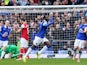 Romelu Lukaku of Everton celebrates scoring the second goal during the Barclays Premier League match between Everton and Arsenal at Goodison Park on April 6, 2014