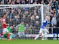 Steven Naismith of Everton celebrates scoring the first goal during the Barclays Premier League match between Everton and Arsenal at Goodison Park on April 6, 2014