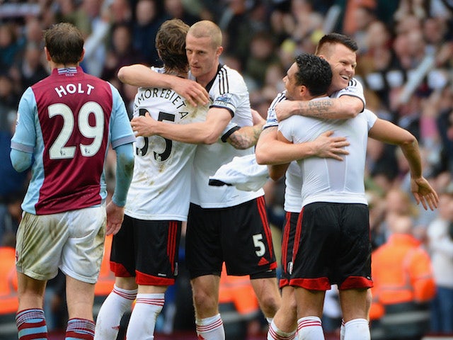 Fernando Amorebieta, Brede Hangeland, John Arne Riise and Kieran Richardson of Fulham celebrate at the end of the match against Aston Villa on April 5, 2014