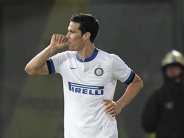 Hernanes of FC Internazionale Milano celebrates after scoring a goal during the Serie A match between AS Livorno Calcio and FC Internazionale Milano at Stadio Armando Picchi on March 31, 2014