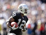 Jacoby Ford #12 of the Oakland Raiders in action against the Washington Redskins at O.co Coliseum on September 29, 2013