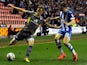 James McArthur (R) of Wigan Athletic in action with Andy King of Leicester City during the Sky Bet Championship match on April 1, 2014
