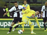 Jose Maria Callejon (R) of SSC Napoli competes for the ball with Marco Marchionni (L) of Parma FC during the Serie A match on April 6, 2014
