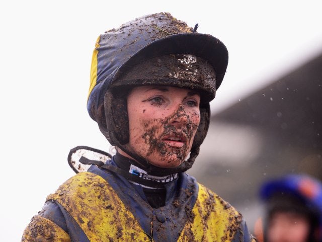 Katie Walsh splattered in mud after a race at the Cheltenham Fesitval on March 13, 2013.