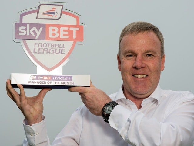 Wolves manager Kenny Jackett with his Manager of the Month award on April 3, 2014