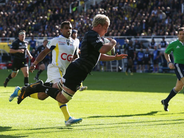 Jordan Crane of Leicester dives to score a try during the Heineken Cup quarter final match between Clermont Auvergne and Leicester Tigers at Stade Marcel Michelin on April 5, 2014