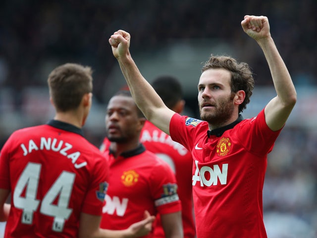 Juan Mata of Manchester United celebrates scoring their second goal during the Barclays Premier League match between Newcastle United and Manchester United at St James' Park on April 5, 2014