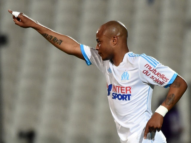 Marseille's Ghanaian forward Andre Ayew reacts after scoring a goal during the French L1 football match Marseille vs Ajaccio at the Velodrome Stadium in Marseille, southern France, on April 4, 2014