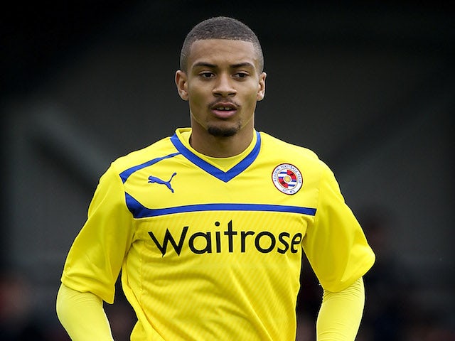 Michael Hector of Reading in action during a pre season friendly match between AFC Wimbledon and Reading at the Kingsmeadow Stadium on July 14, 2012