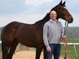 Owen Mike Tindall stands with Monbeg Dude on March 26, 2014.