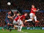 Nemanja Vidic of Manchester United heads in the first goal during the UEFA Champions League Quarter Final first leg match against Bayern Munich on April 1, 2014