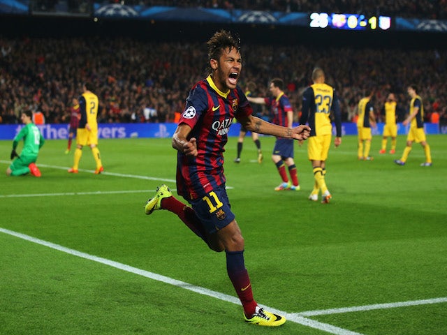 Neymar of Barcelona celebrates his goal during the UEFA Champions League Quarter Final first leg match against Atletico de Madrid on April 1, 2014