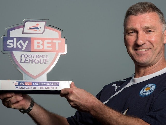 Leicester boss Nigel Pearson with his Manager of the Month award on April 3, 2014