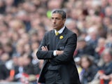 Chris Hughton, Manager of Norwich City on the touchline during the Barclays Premier League match between Swansea City and Norwich City at Liberty Stadium on March 29, 2014