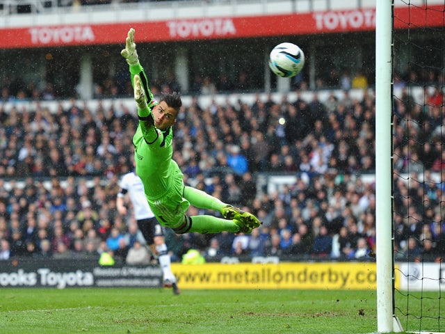 Karl Darlow of Nottingham Forest in action during the Sky Bet Championship match between Derby County and Nottingham Forest at iPro Stadium on March 23, 2014