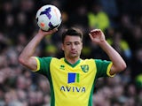 Russell Martin of Norwich City takes a throw during the Barclays Premier League match between Norwich City and Sunderland at Carrow Road on March 22, 2014