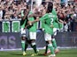 St Etienne's Ivorian forward Max-Alain Gradel is congratulated by his teammates Josuha Guilavogui (L) after scoring a goal during the French L1 football match Saint-Etienne (ASSE) vs Nice (OGC) on April 6, 2014