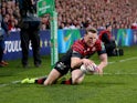 Chris Ashton of Saracens dives over to score a try during the Heineken Cup Quarter-Final match between Ulster and Saracens at Ravenhill on April 5, 2014