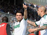 Nicola Sansone of US Sassuolo Calcio celebrates scoring the first goal during the Serie A match between Atalanta BC and US Sassuolo Calcio at Stadio Atleti Azzurri d'Italia on April 6, 2014
