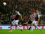 Adam Johnson of Sunderland scores a goal to bring his team back into contention at 2-1 during the Barclays Premier League match between Sunderland and West Ham United at the Stadium of Light on March 31, 2014 