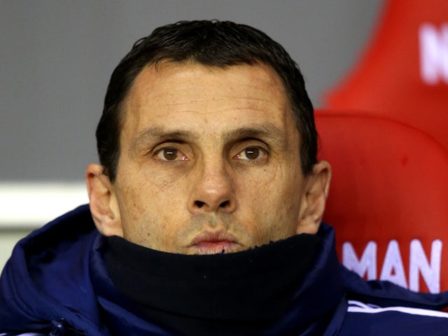 Gustavo Poyet the Sunderland manager looks on during the Barclays Premier League match between Sunderland and West Ham United at the Stadium of Light on March 31, 2014