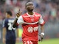 Valenciennes's Majeed Waris celebrates after scoring a goal during the French L1 football match Valenciennes vs Lyon on April 6, 2014