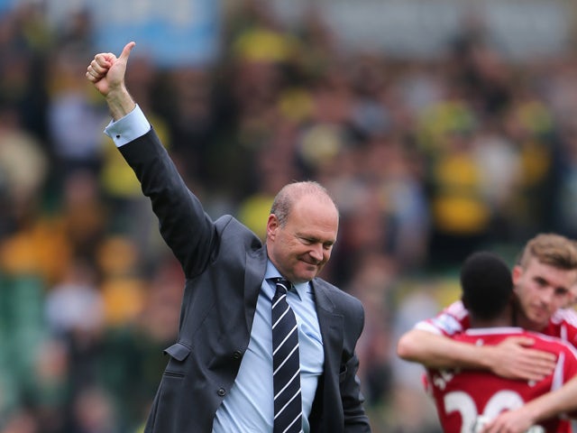 Manager Pepe Mel of West Brom celebrates their victory after the Barclays Premier League match between Norwich City and West Bromwich Albion at Carrow Road on April 5, 2014