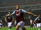 Andy Carroll of West Ham celebrates after scoring the opening goal during the Barclays Premier League match between Sunderland and West Ham United at the Stadium of Light on March 31, 2014
