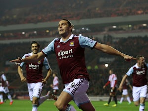 Andy Carroll features in friendly