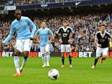 Yaya Toure of Manchester City scores the opening goal from the penalty spot during the Barclays Premier League match against Southampton on April 5, 2014