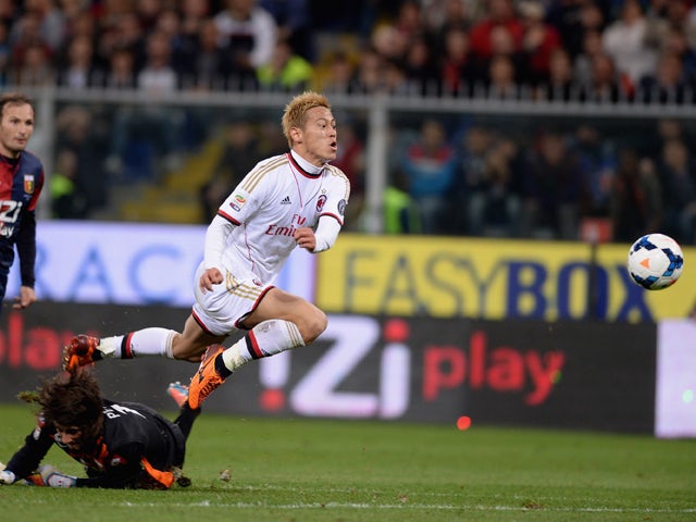 Keisuke Honda of AC Milan #10 scores the second goal during the Serie A match between Genoa CFC v AC Milan at Stadio Luigi Ferraris on April 7, 2014