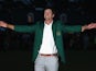 Adam Scott smiles after receiving his green jacket for winning The Masters at Augusta National on April 14, 2013