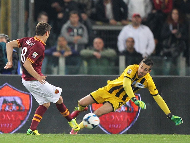 Roma's Adem Ljajic scores his team's second goal against Atalanta during the Serie A match on April 12, 2014