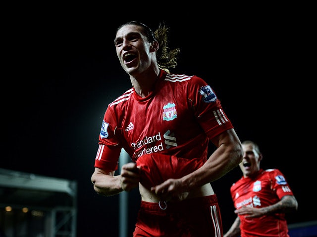 Liverpool's Andy Carroll celebrates after scoring the winning goal against Blackburn during the Premier League match on April 10, 2012