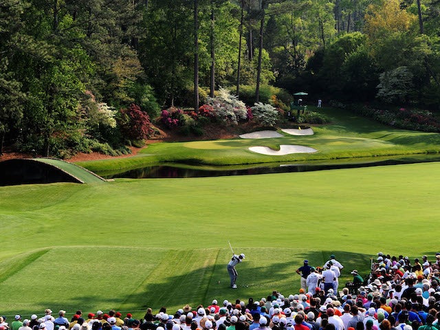 Tiger Woods hits his tee shot on the 12th hole during the second round of the 2011 Masters Tournament at Augusta National Golf Club on April 8, 2011