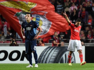 Rodrigo fires Benfica to the semis