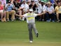 Bubba Watson of the US reacts after making a birdie putt on the 14th green during the second round of the 78th Masters Golf Tournament at Augusta National Golf Club on April 11, 2014