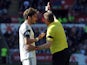 Swansea's Chico Flores is sent off by referee Phil Dowd against Chelsea during the first half of the Premier League match on April 13, 2014