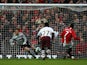 Manchester United's Cristiano Ronaldo scores the opening goal via the penalty spot against Arsenal during the Premier League match on April 13, 2008