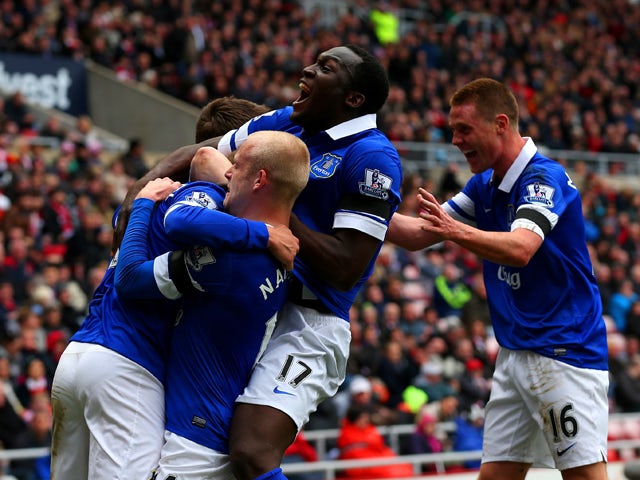 Steven Naismith, Romelu Lukaku and James McCarthy of Everton celebrate after Wes Brown of Sunderland scores an own goal during the Barclays Premier League match between Sunderland and Everton at Stadium of Light on April 12, 2014
