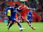 Fraizer Campbell of Cardiff is pursued by Dejan Lovren of Southampton during the Barclays Premier League match on April 12, 2014