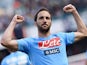 Napoli's Gonzalo Higuain celebrates after scoring his team's second goal against Lazio during the Serie A match on April 13, 2014
