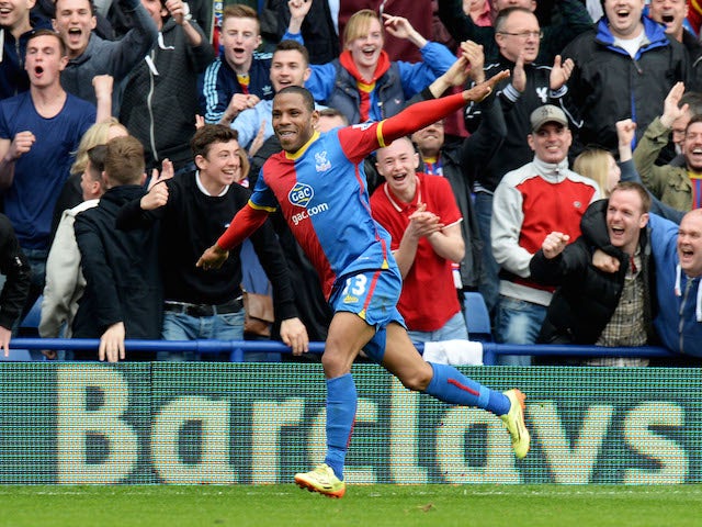 Jason Puncheon of Crystal Palace celebrates as he scores their first goal during the Barclays Premier League match on April 12, 2014