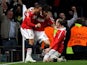 Manchester United's Ji-Sung Park celebrates with teammates after scoring his team's second goal against Chelsea during the Champions League quarter final match on April 12, 2011