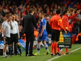 Head Coach Laurent Blanc of PSG shakes hands with Eden Hazard of Chelsea as he is replaced by Andre Schurrle of Chelsea during the UEFA Champions League Quarter Final second leg match between Chelsea and Paris Saint-Germain FC at Stamford Bridge on April 