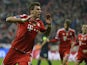 Bayern Munich's Mario Mandzukic celebrates after scoring his team's opening goal against Manchester United in the Champions League quarter final match on April 9, 2014