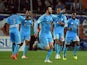 Marseille's French forward Andre-Pierre Gignac celebrateswith teammates after scoring a goal on April 11, 2014 